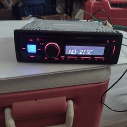 Alpine Automotive CD Receiver With OEM Wiring Harness And OEM Mounting Sleeve