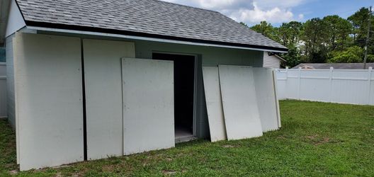 5 Hurricane Windows and 2 Door Wood Boards 