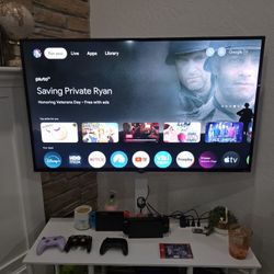 TCL 55" 4K Roku TV &  FREE Google TV Device