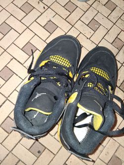Jordan's Black and Yellow Sneakers