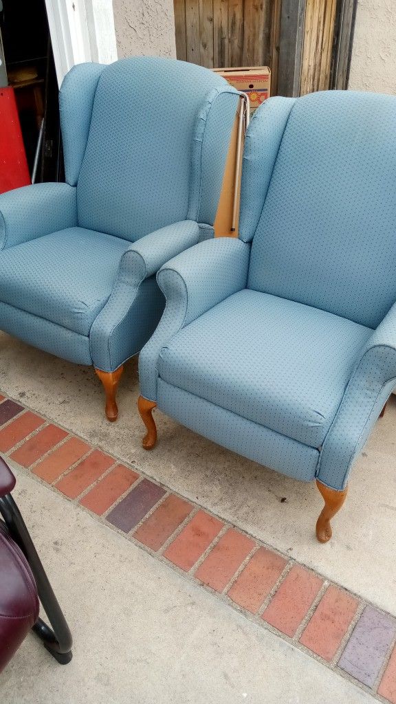 Two Blue Recliner Chairs