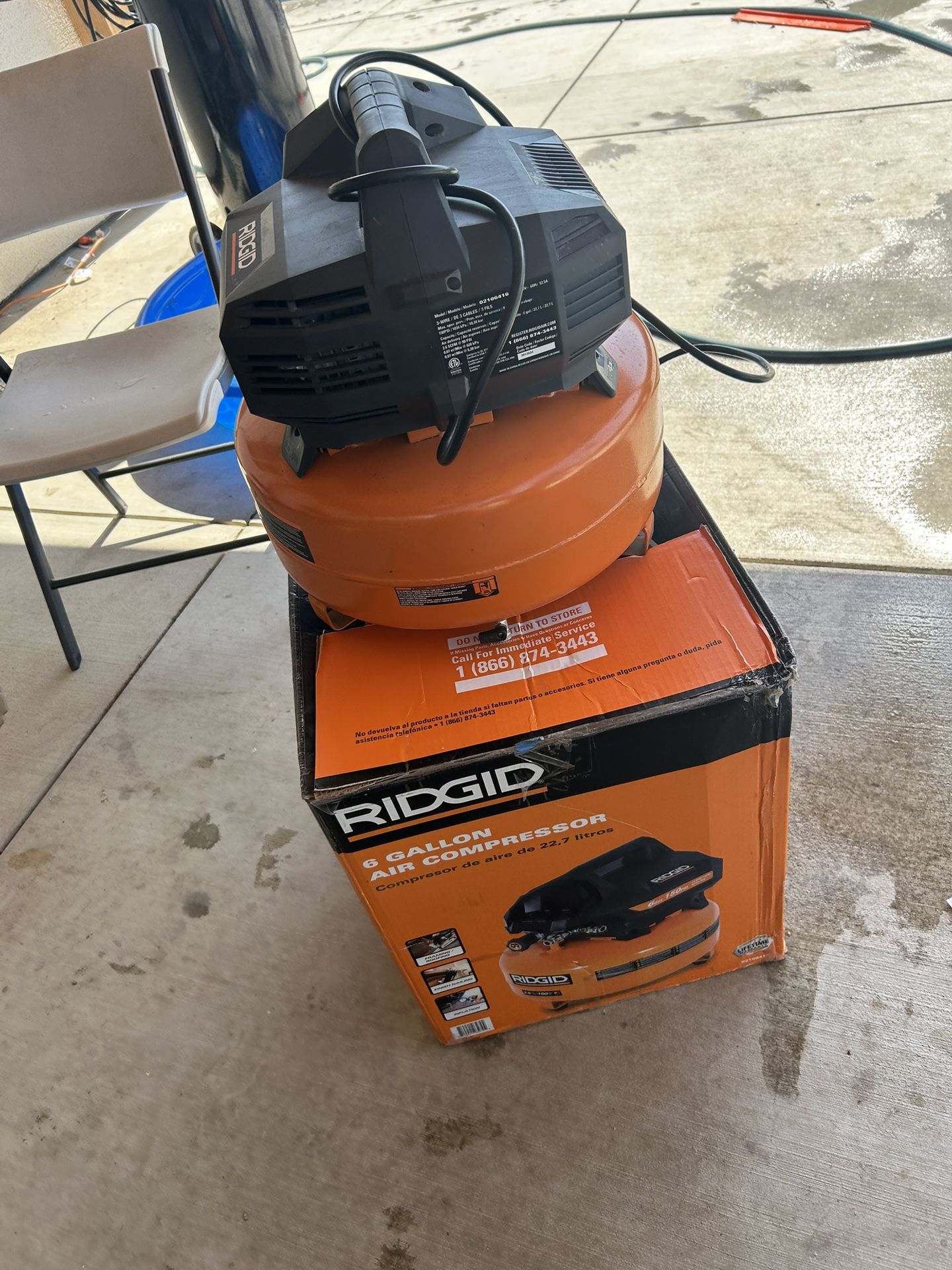RIDGID 6 Gal. 150 PSI Portable Electric Oil-Free Jobsite Pancake Air Compressor with Dual Pressure Gauges and 2-Quick Couplers