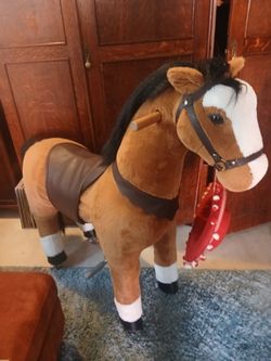 Toy plush mechanical riding horse