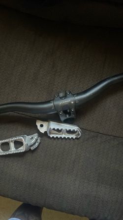 surron handlebars and adapter and pegs