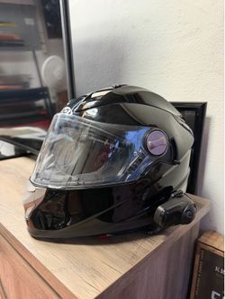 Sedici motorcycle helmet with Bluetooth headset