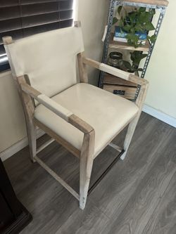 Nice High Arm Chair Creamy Color .