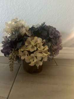 Floral Arrangement in Metal Vase