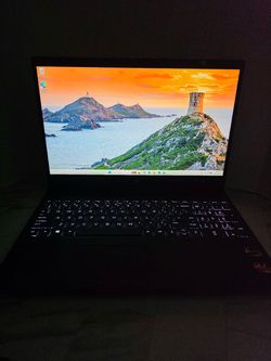 CARBON FIBER BLK HP Envy x360 convertible aluminum body laptop with a full HD display, backlit keyboard, numeric keypad, and AMD Ryzen processor. Runn