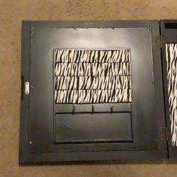 Mirrored jewelry box/armoire with magnetic closure $40