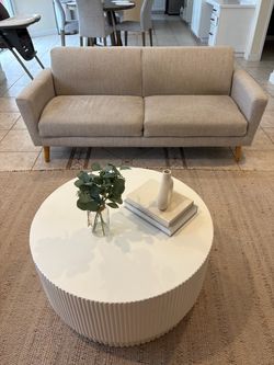 Two seat couch, chairs, and coffee table