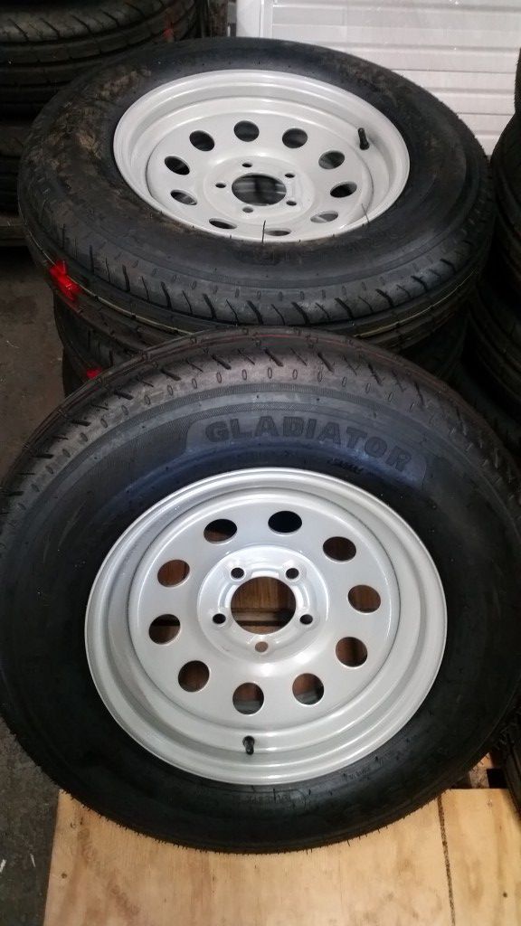 ST 225 / 75 D 15 Trailer tires on silver mod wheels