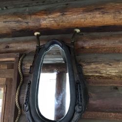 Antique leather horse collar mirror