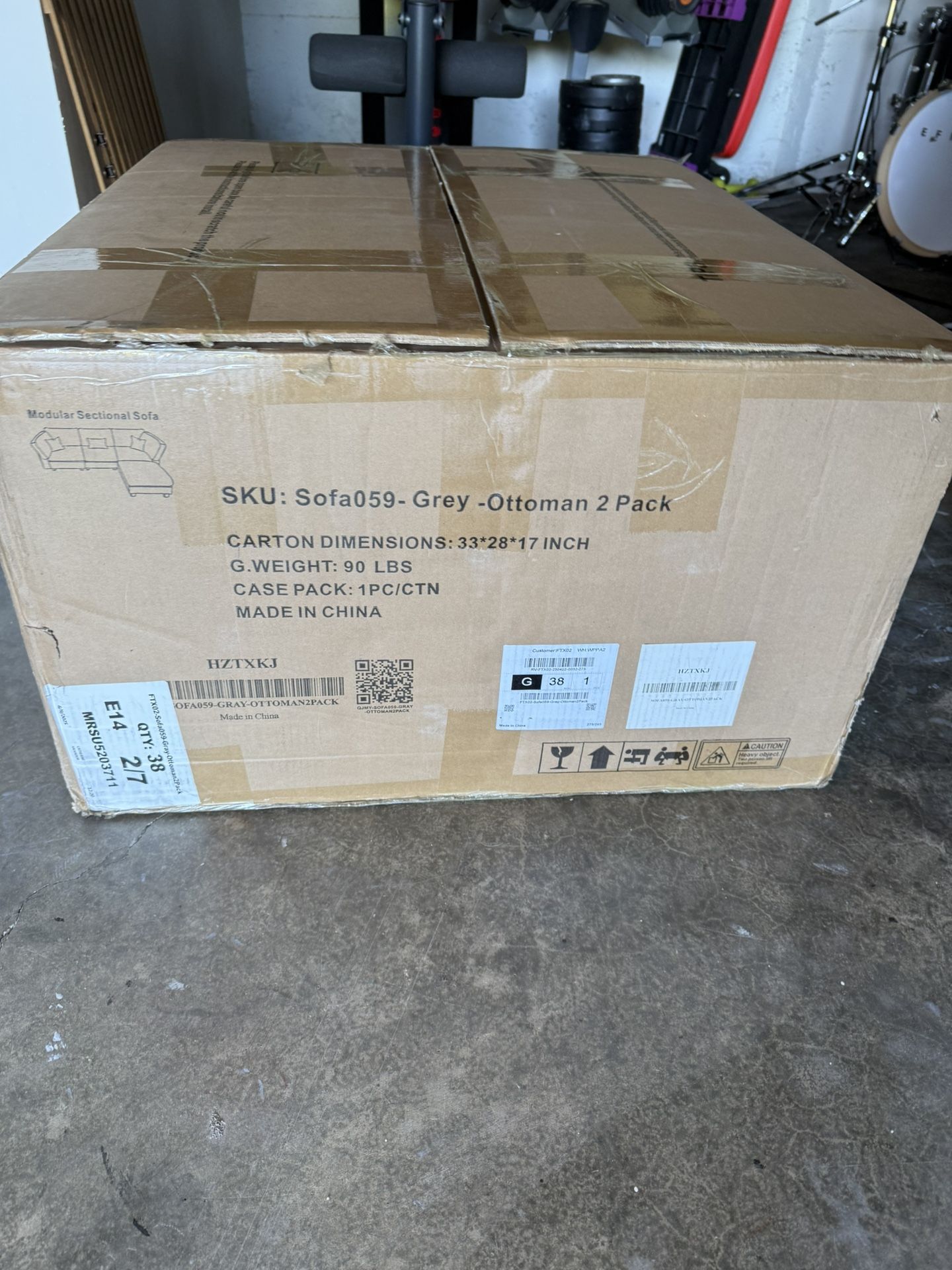 Two Grey Ottomans