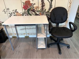 Desk & office chair with arms.