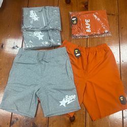 Bape grey shorts and orange beach shorts