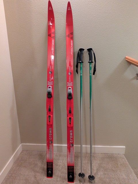 Child / kid Cross Country skis by Fischer Austria. Cross Country Crown with binders and 42" Salomon aluminum poles. Skis are 140 / N640