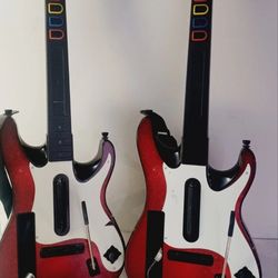 Lot 2 Nintendo Wii Red Octane  Guitar Hero Controllers mint condition with  Straps