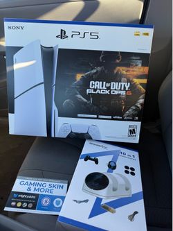 Ps5? With charging port and skins card and call of duty