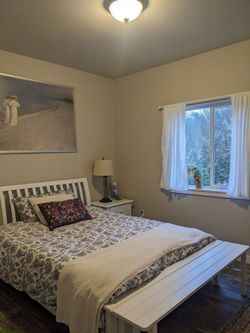 Bed frame, mattress and side table