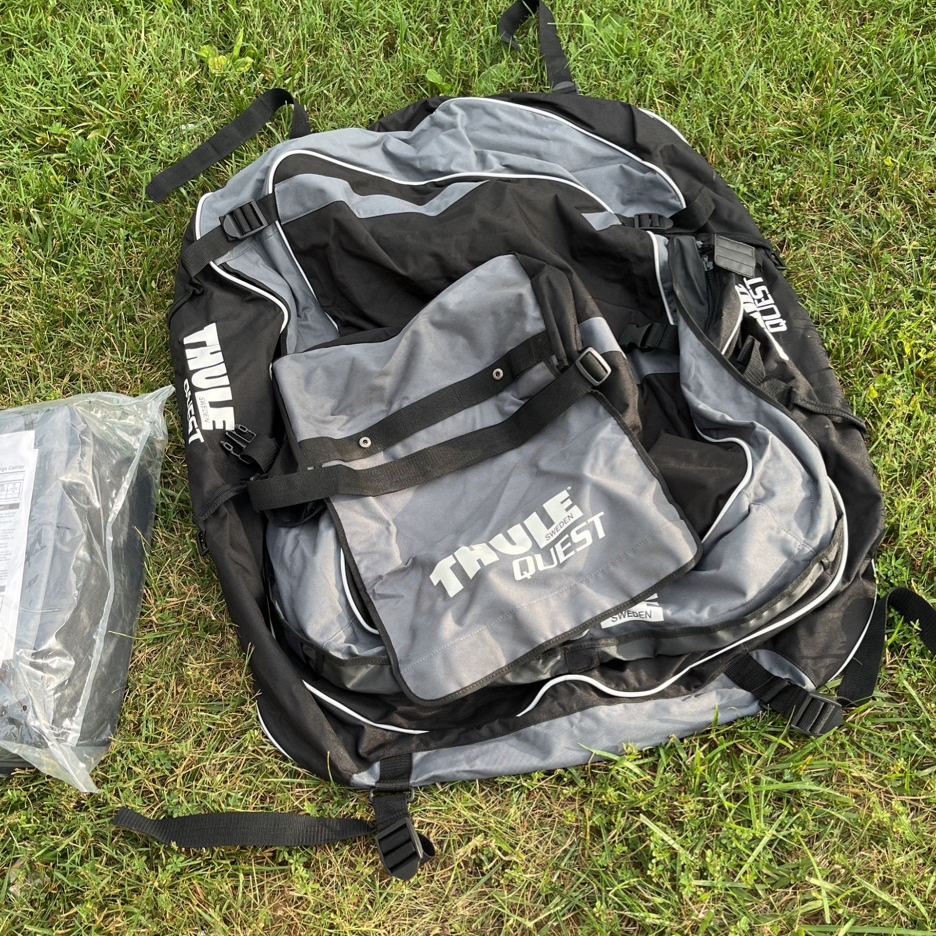 TWO Thule Rooftop Cargo Bags