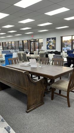 Floor Model Just Like Brand New Dining Set includes Large Dining Table + 4 Chairs + Large Bench  *86-inch table with pine solids and distinct trestle 