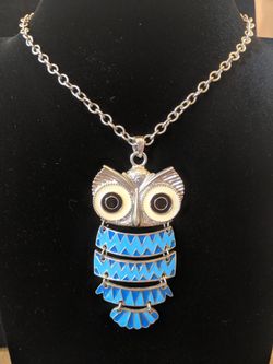 $10. Blue enamel owl articulated pendant necklace. Necklace is 32-IN long. Pendant is 3 in long and 1.5 in wide.