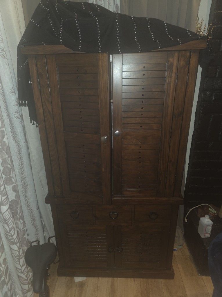 Pier One Imports Armoire.