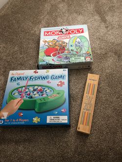 Variety of kids games including monopoly junior and pick up sticks