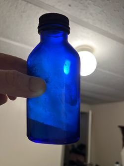 Vintage cobalt blue Phillips Milk of Magnesia bottle.