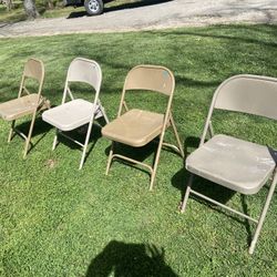 4 Folding Chairs 