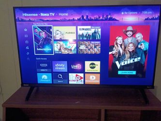 New 32 inch Hisence Roku Qled smart TV with remote control 2026