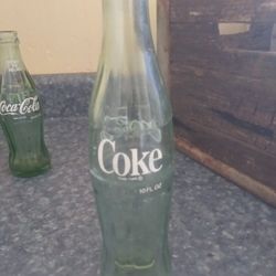 Assorted Glass Bottles And An Old Milk Crate