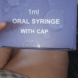Oral syringes with caps intended for colostrum collection