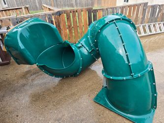 Spiral slide for playground swing set