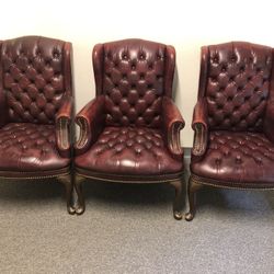 Three Red Vinyl Wingback Chairs