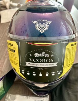 VCOROS flip-up modular motorcycle helmet featuring an iridescent, color-shifting finish and a dual-visor system