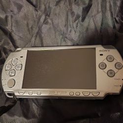 Sony PSP Slim & Lite Handheld Game Console - Ice Silver