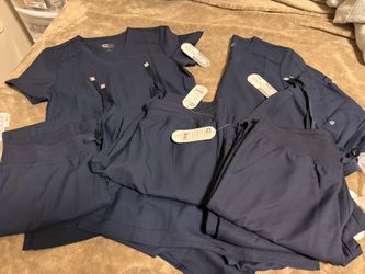 Brand new Koi Cureology scrubs