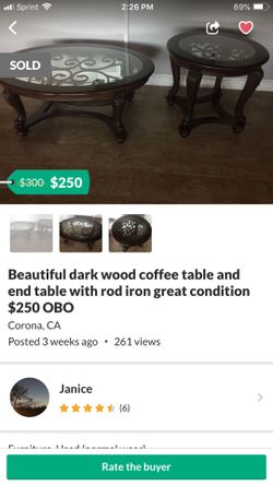 Beautiful dark wood coffee table and end table with rod iron great condition $250 OBO