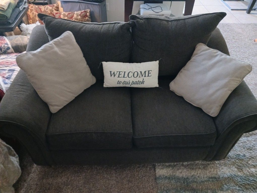 Spotless gray love seat $150 firm must pick up no rips no stains no tears No smells excellent condition very comfy no sink in cushions can help load B