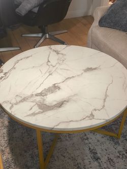 Round coffee table — marble-look top, gold legs