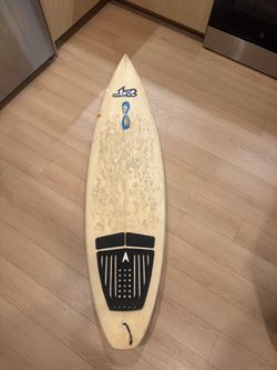 Two surfboards for sale, one Lost Infinity shaped by the late Terry Senate and a Channel Islands step up