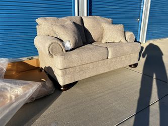 Brand New. Ashley Furniture Love Seat. Only 1 available. $399.  