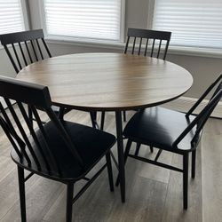 Round Dining Table And Chairs