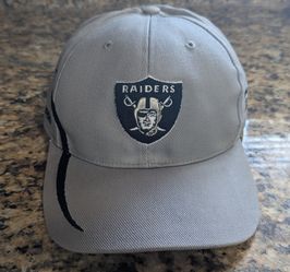 Oakland Raiders Curved Swoop Velcro Back Hat.