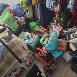 Whole Bunch Of Kids Clothes And Toys 