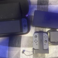 Nintendo Switch + Joy Cons