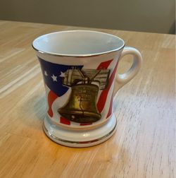 Vintage Ceramic Mug Featuring the Liberty Bell and American Flag