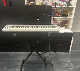 Keyboard, stand, music stand and stool