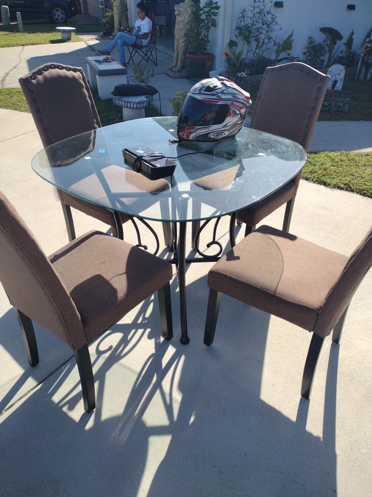 Round Glass Table Four Chairs$170